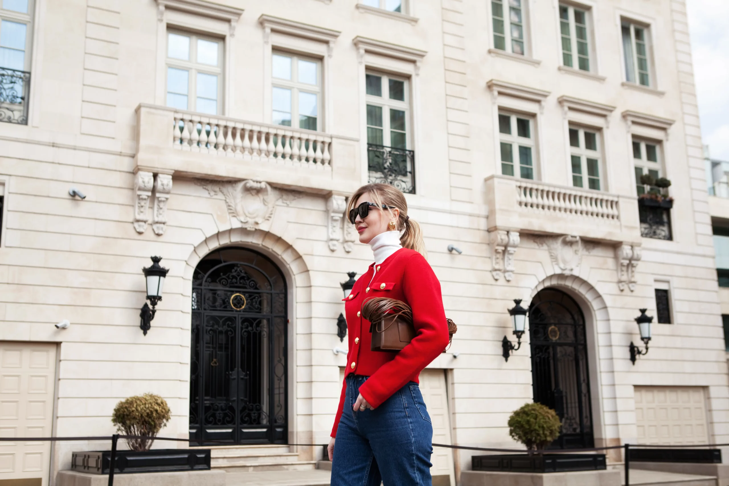 stylish-woman-in-red-jacket-posing-in-city-2026-03-17-00-43-56-utc