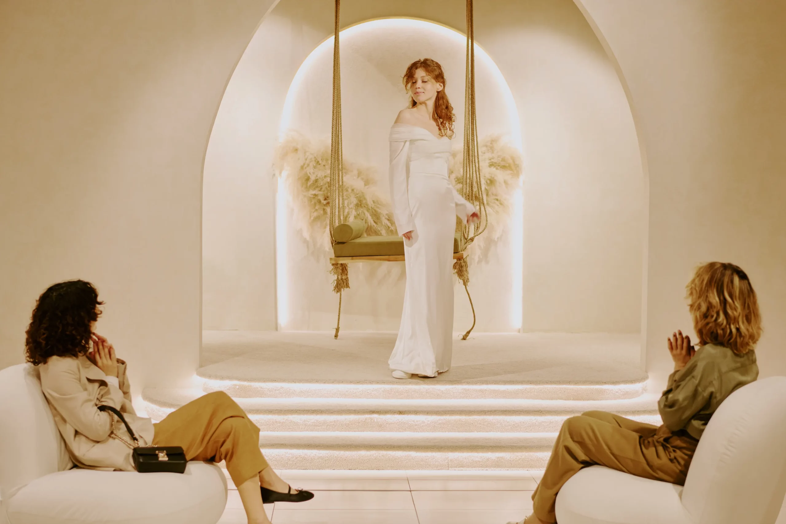 woman-posing-in-a-white-gown-in-showroom-2026-01-08-00-09-07-utc